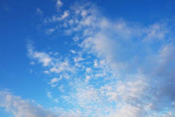 High clouds in the summer sky. Sky background. Meteorological observations of the sky.
