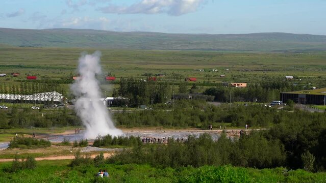 Impressive view of Icelands Geysir Geisir in the Golden Circule, the geothermal activity and a attraction for tourists in Iceland