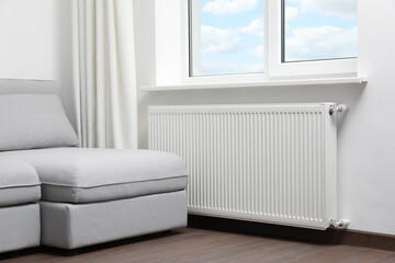 Modern radiator at home. Central heating system - obrazy, fototapety, plakaty