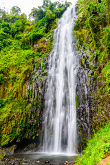 Fototapeta na wymiar View of Materuni waterfall at foot of mountain Kilimanjaro not far from the city Moshi, Tanzania