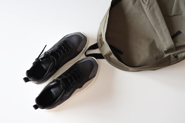 Men's sneakers and a backpack for a walk