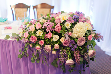 Floral decorations on the wedding table, close-up