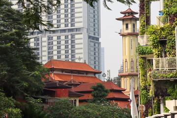 Fototapeta na wymiar Hidayatullah Mosque is a historic building that is squeezed between tall buildings in karet Semanggi area, South Jakarta has a form of Chinese architecture built in 1743.