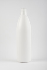 Large clean bottle of shampoo, on a white background