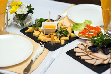 cold appetizers, cheese on the festive table