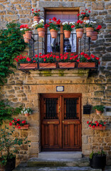 Fototapeta na wymiar Old stone houses in a medieval village of Ujue in Basque Country, Navarra, Spain