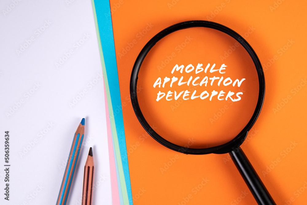 Poster mobile application developers. magnifying glass on an orange background