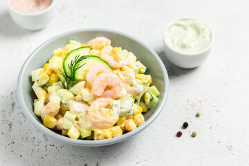 Lemon arugula corn shrimp salad. Copy space.
