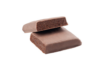 Protein bar with milk chocolate glaze. Chocolate cheesecake flavor. Cut into two pieces. Close-up. White background. Isolated.