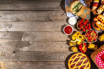 Various picnic barbeque food and drink flatlay. Summer bbq picnic food, assorted grilled meats,...