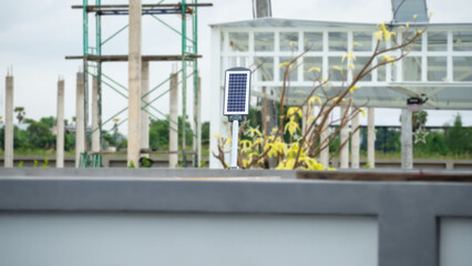 Close-up shot, outdoor solar light mounted on a wall. For homes, buildings. Future technology,...