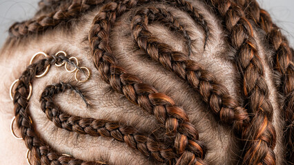 Close-up of braids on the head of a caucasian woman.