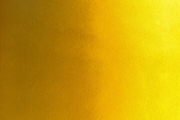 Gold texture background with yellow luxury shiny shine glitter sparkle of bright light reflection pattern golden surface