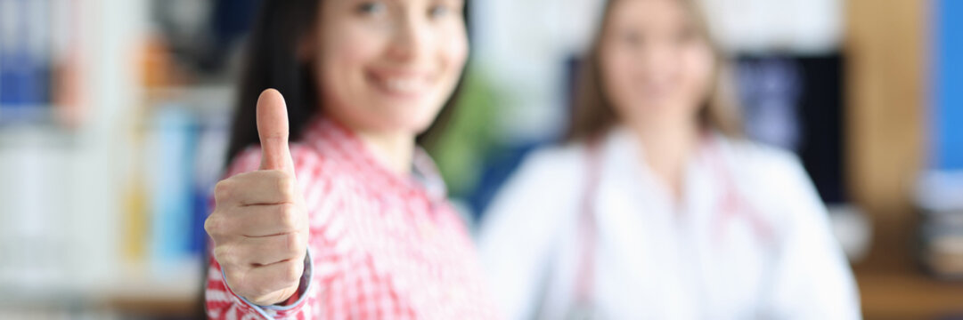 Happy Woman In The Doctor's Office Rejoices In Recovery