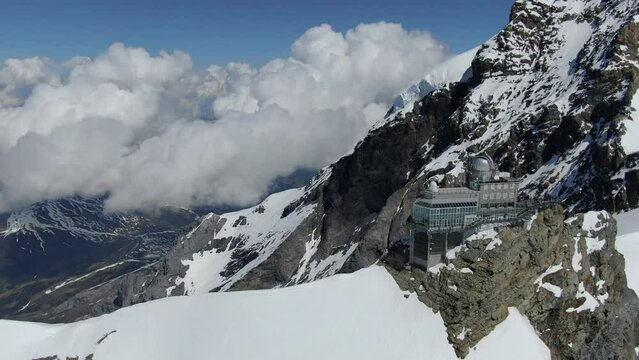 Flying over Sphinx astronomical observatory at Jungfraujoch, Switzerland