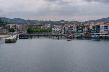 Fototapeta na wymiar view of the harbor and fishing village of Lekeitio on the coast of the Spanish Basque Country