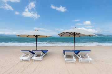 Nha Trang beach with umbrellas and chairs 