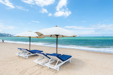 Nha Trang beach with umbrellas and chairs 