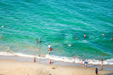 People swimming on the Nha Trang beach