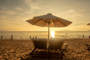 Nha Trang beach with umbrellas and chairs 