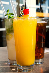 Summer refreshment vibes - colorful and tasty cold cocktails on the beach of Cyprus