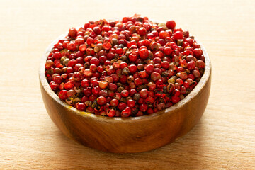 red pepper seeds in wooden plate