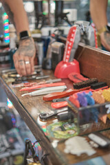 Barber tools lying on the table at barber shop