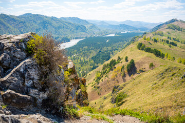 View with mountains, river Katun and valley from top of the rock - damn finger - in the mountainous Altai, Russia 
