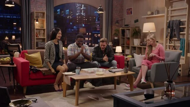 Television Sitcom Concept. Four Diverse Friends having Fun in Living Room. Funny Sketch of One Couple Eating Pizza the Other Dieting. Comedy Series Broadcasting on Network Channel, Streaming Service