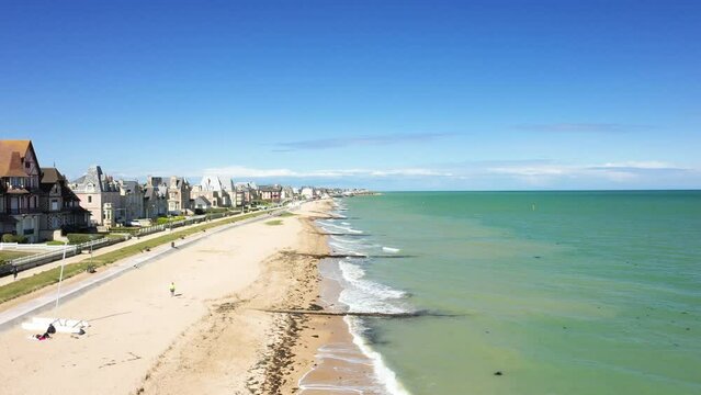 The traditional houses of Sword beach in Europe, France, Normandy, towards Ouistreham, at Lion sur Mer, in spring, on a sunny day.