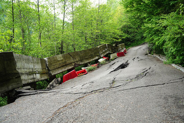 Asphalt road cracked and broken from earthquake
