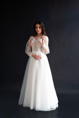 Fototapeta premium Beautiful bride perfect style. Wedding hairstyle make-up luxury wedding dress