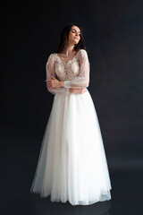 Fototapeta na wymiar Beautiful bride perfect style. Wedding hairstyle make-up luxury wedding dress