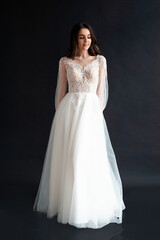 Fototapeta na wymiar Beautiful bride perfect style. Wedding hairstyle make-up luxury wedding dress