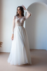Obraz na płótnie Canvas Beautiful bride perfect style. Wedding hairstyle make-up luxury wedding dress
