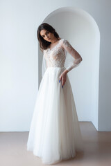 Fototapeta premium Beautiful bride perfect style. Wedding hairstyle make-up luxury wedding dress