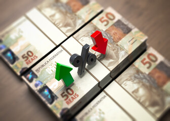 Brazilian reais banknote, percentage symbol, and red-green finance arrows. Horizontal composition. Isolated with clipping path.