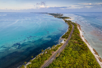 Aerial view of tropical beach landscape and local road at addu city, the southernmost atoll of Maldives in Indian ocean. Maldives tourism and summer vacation concepts - obrazy, fototapety, plakaty