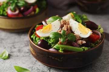 Deurstickers Nicoise salad - traditional French dish © nastyakamysheva