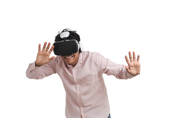 Young peruvian man laughing using virtual reality headset. Isolated over white background.