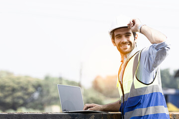 Engineer man standing on a construction site for portraits in a happy mood.