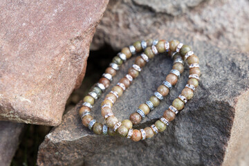Two bracelets made of natural jasper stones beads. Handmade jewelry. Woman exoteric accessories. Talismans and amulets.