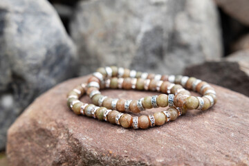 Two bracelets made of natural jasper stones beads. Handmade jewelry. Woman exoteric accessories. Talismans and amulets.