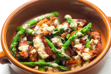 green asparagus with bacon and mustard sauce