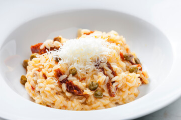 Italian risotto with dry tomatoes and capers
