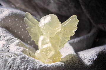 Beautiful resin angel with abstract background