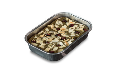 Almond green tea brownies in foil tray in white background