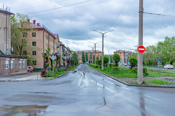 Fototapeta na wymiar The streets of a small provincial town after the rain