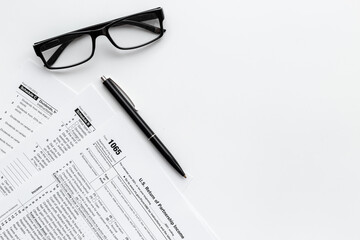 Fototapeta premium Pen on US individual tax form. Tax payment season