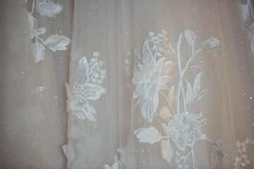 Lace and embroidery with beads on fabric wedding dresses